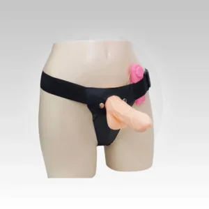 The Aero Hollow Vibrating Harness Dildo is displayed on a wearable harness, featuring an adjustable waistband, realistic dildo, and discreet online availability across India.