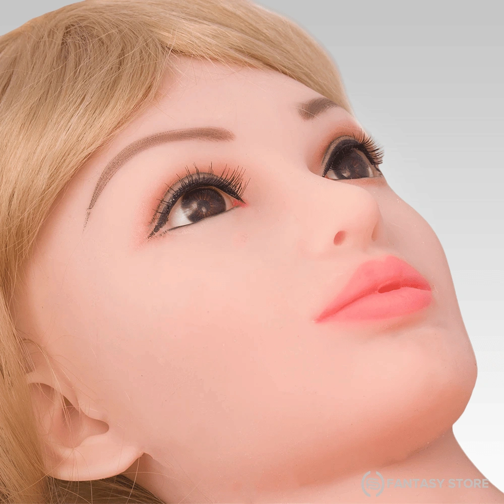 amora-10kg-real-feel-torso-sex-doll-face-lucknow Close-up of the Amora 10KG Real Feel Torso Sex Doll showing its realistic face, detailed eyes, blonde hair, and lifelike skin finish for adult shoppers in Lucknow, Uttar Pradesh.