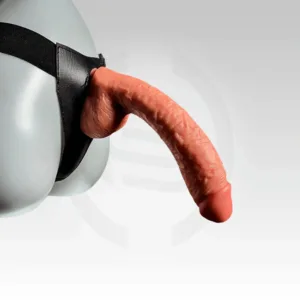 ForgeFit 10-Inch Realistic Strap-On Dildo shown attached to a wearable harness, highlighting its curved shape, realistic finish, and secure strap design for customers in Chandigarh, Punjab.