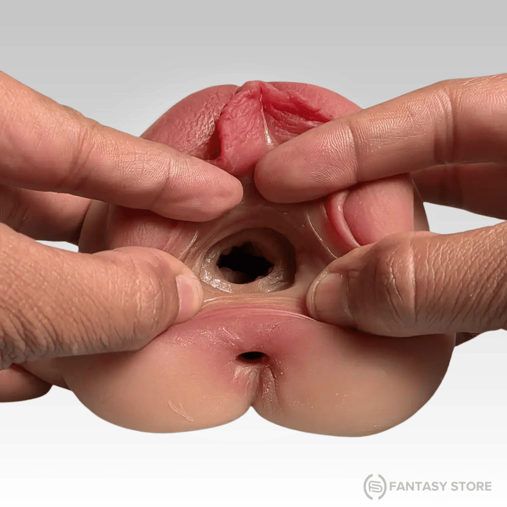 TriSense Real Feel Triple Texture Masturbator dual-entry design with realistic vagina and anal openings made from soft body-safe Material.