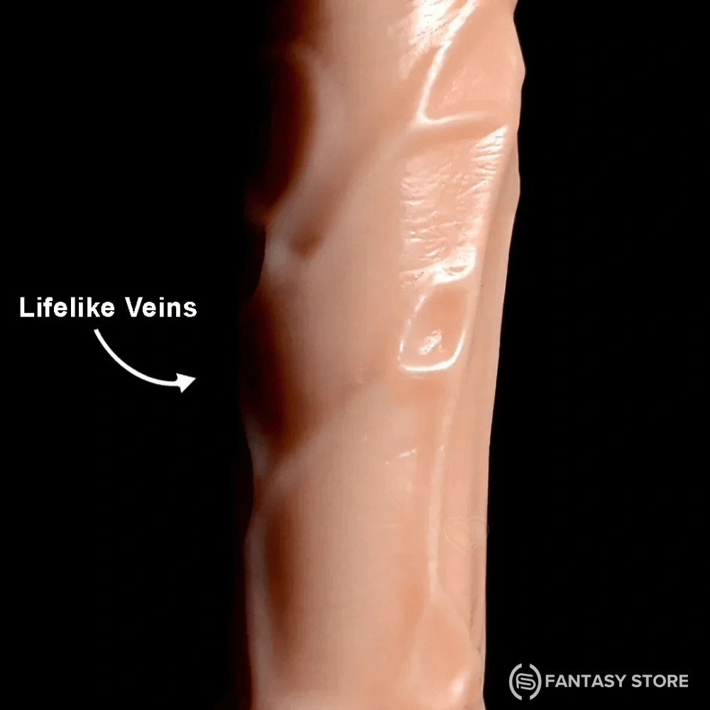 rideflex-strap-on-harness-dildo-realistic-veins.webp Close-up of the RideFlex Strap-On Harness Dildo highlighting realistic veins and detailed skin texture.