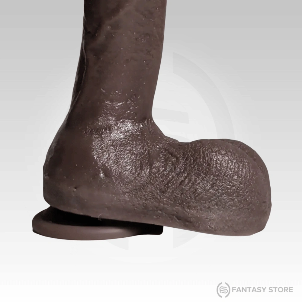 strong-suction-cup-realistic-black-dildo.webp Realistic black silicone dildo with strong suction cup base for hands-free use on smooth surfaces.